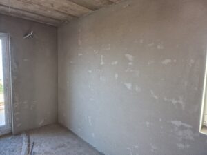 Strojno zbukanje obiteljske kuće Baumit žbukom u Požegi